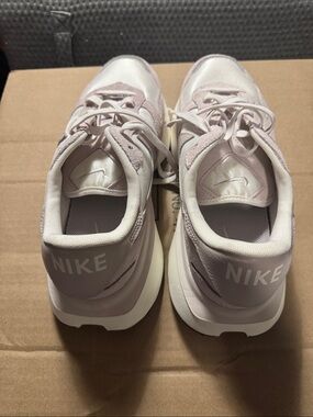Nike Women's Pale Pink and White Sneakers